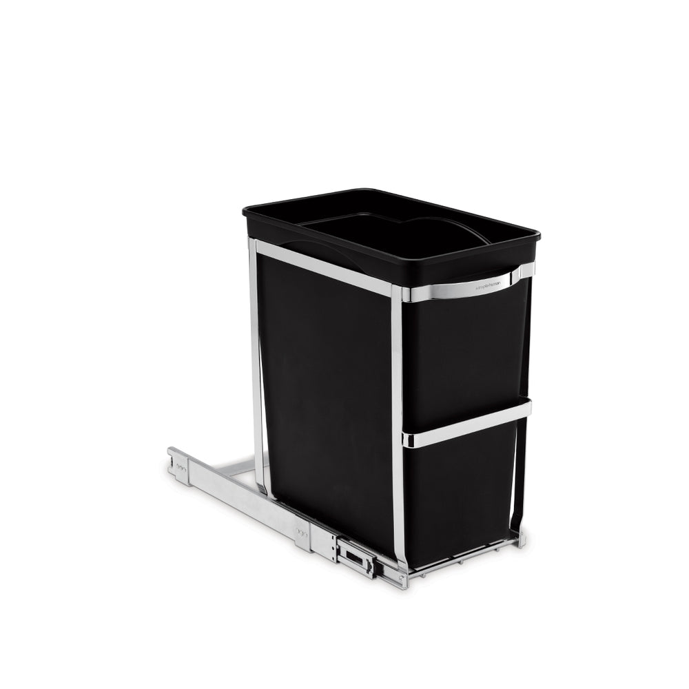 Angled view of Simplehuman 30L Pull-Out Can in Polished Stainless Steel, heavy-duty slide system for hidden storage.