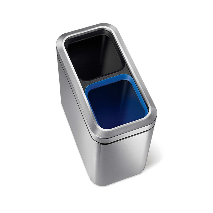 Angled view of Simplehuman Brushed Stainless Steel 20L Slim Open Can showing removable black and blue internal liners.