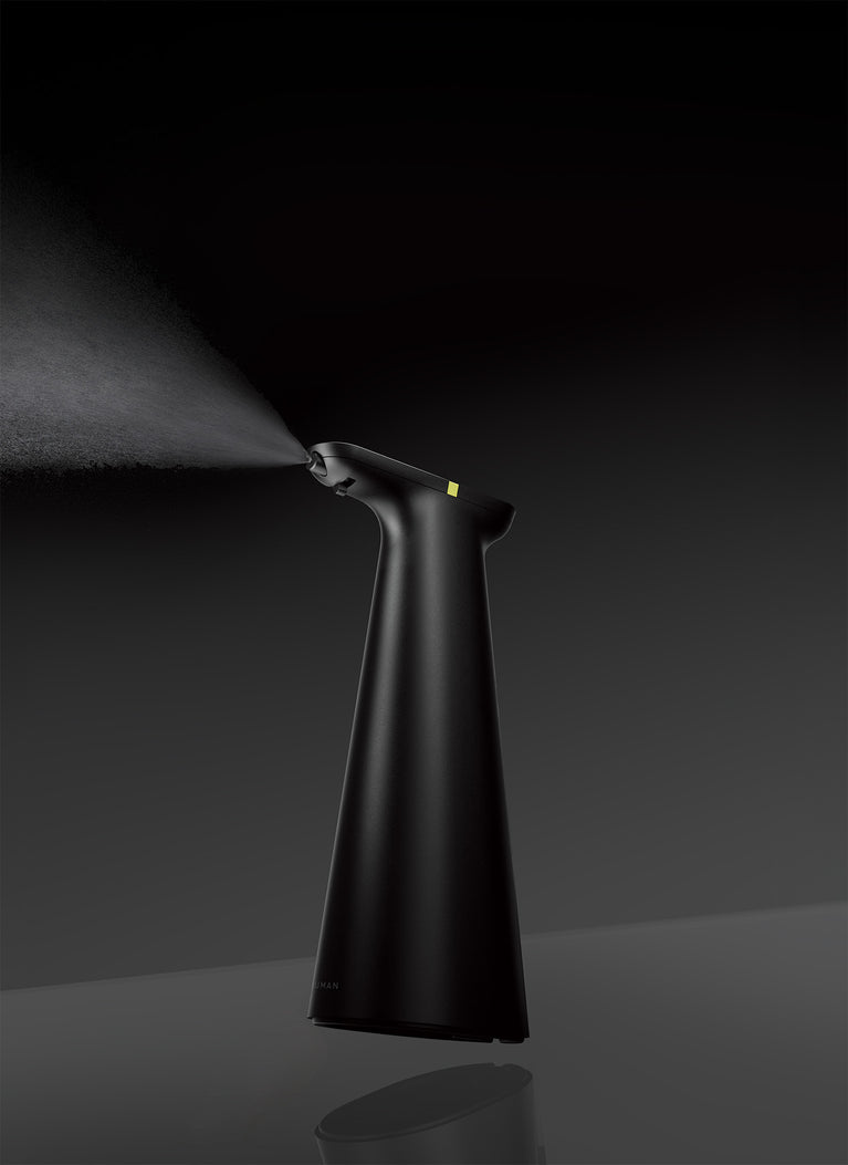 Simplehuman's Sensor Spray on a black gradient background. 