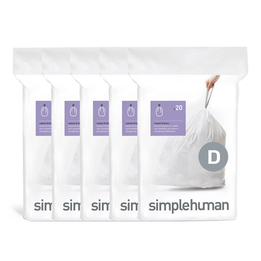 Simplehuman Code D Custom Fit Liners 5-pack bundle, clear liner material, showing hand using strong drawstring tie for carrying.