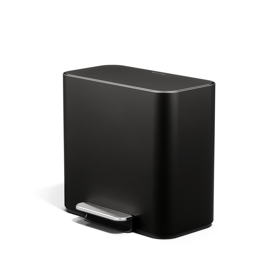 Simplehuman 16L Matte Black Mini Step Can with pedal, angled view.