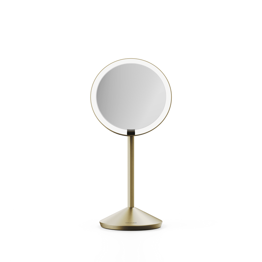 Simplehuman's Sensor Mirror Fold in Matte Gold, front facing view.