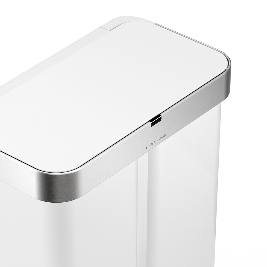 Detail view of Simplehuman 58L Sensor Recycler lid in White/Brushed Stainless Steel, highlighting the touch-free sensor.